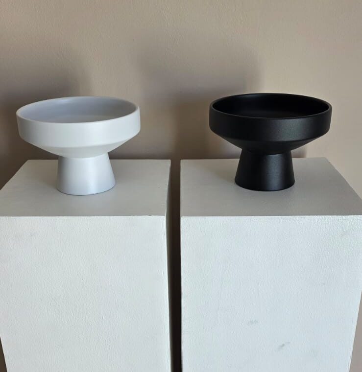 Black and white clay round vase