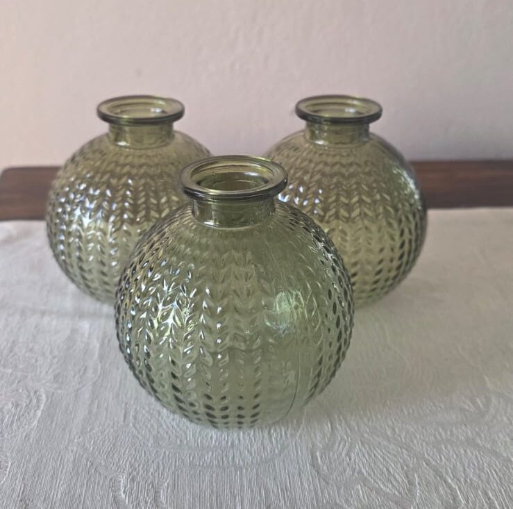 Green ribbed glass vase